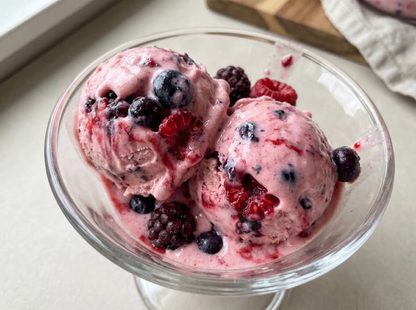 Berry Blast Ninja Creami recipe made with CRUSHS strawberry protein ice cream mix and mixed berries.