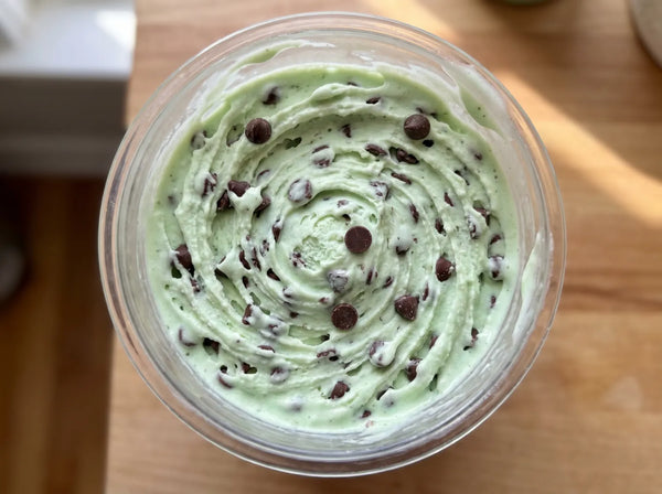 Mint Chip Ninja Creami recipe made with CRUSHS vanilla protein ice cream mix, mint extract, and mini chocolate chips.