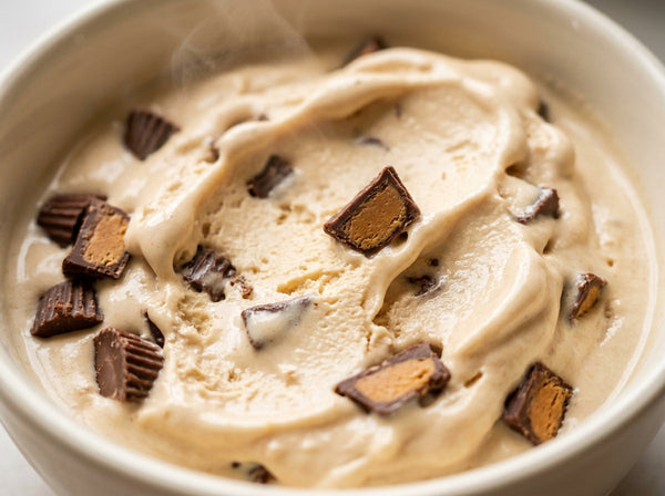 Mint Peanut Butter Cup Ninja Creami mix-in with chopped peanut butter cups.