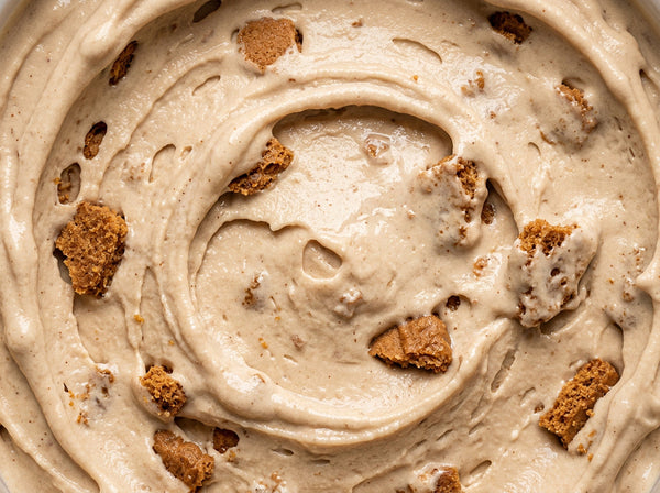 Cinnamon Biscoff Crunch Ninja Creami mix-in with cinnamon and crushed Biscoff cookies.