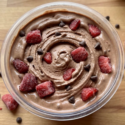 Chocolate Covered Strawberry Ninja Creami recipe made with CRUSHS protein ice cream mix, strawberry chunks, and chocolate chips.