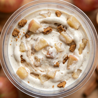Cinnamon Apple Crisp Ninja Creami recipe made with CRUSHS vanilla protein ice cream mix, diced apples, and cinnamon cookies