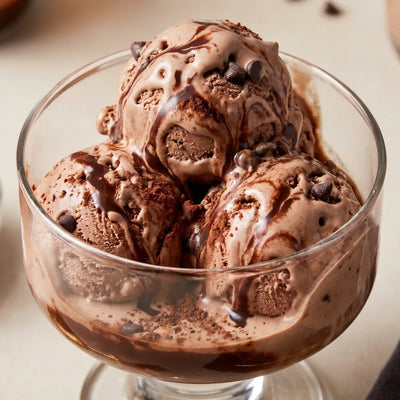 Death by Chocolate Ninja Creami recipe made with CRUSHS chocolate protein ice cream mix, chocolate chips, chocolate syrup, and cocoa powder