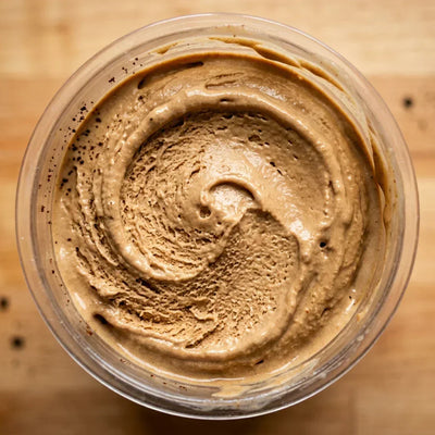 Easy Coffee Ninja Creami recipe made with CRUSHS vanilla protein ice cream mix and espresso powder.