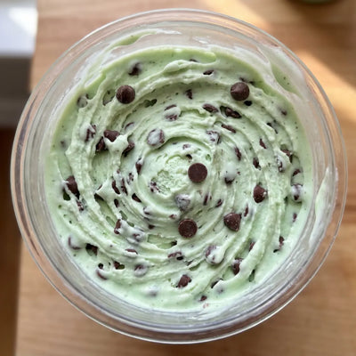 Mint Chip Ninja Creami recipe made with CRUSHS vanilla protein ice cream mix, mint extract, and mini chocolate chips.