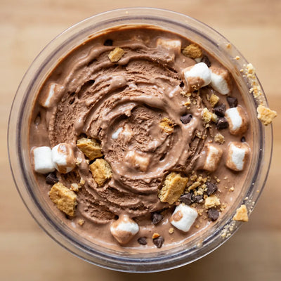 S'mores Crunch Ninja Creami recipe made with CRUSHS chocolate protein ice cream mix, marshmallows, graham crackers, and mini chocolate chips.