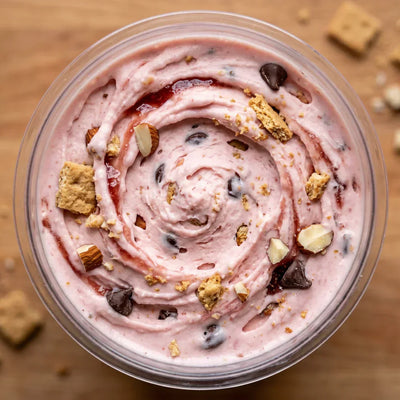 Strawberry Shortcake Ninja Creami mix-in with graham crumbles, almonds, and chocolate chips.