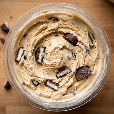 Peppermint Patty Crunch Ninja Creami mix-in with chopped peppermint patties.