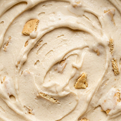 Pumpkin Cheesecake Ninja Creami recipe made with CRUSHS vanilla protein ice cream mix, pumpkin, cream cheese, and graham cracker pieces.