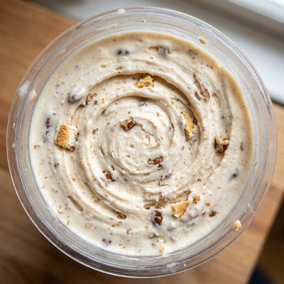 Sweet Potato Casserole Ninja Creami recipe made with CRUSHS vanilla protein ice cream mix, sweet potato, toasted marshmallows, and pecans.
