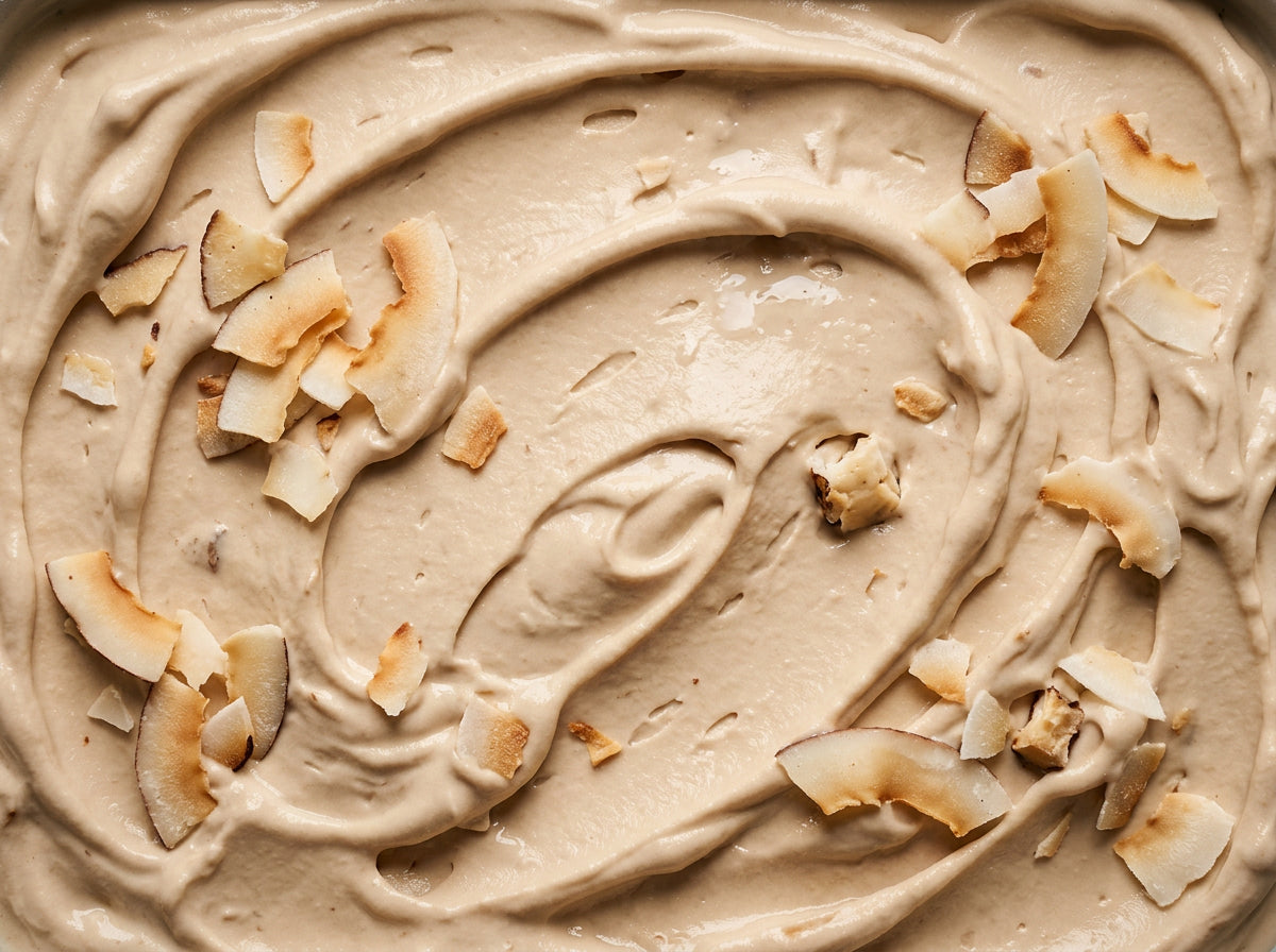 Toasted Coconut Crunch Ninja Creami mix-in with toasted coconut flakes and Cookies and Cream.