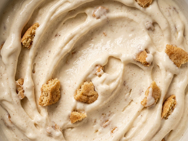 Snickerdoodle Ninja Creami recipe made with CRUSHS vanilla protein ice cream mix, crumbled snickerdoodle cookies, and ground cinnamon.
