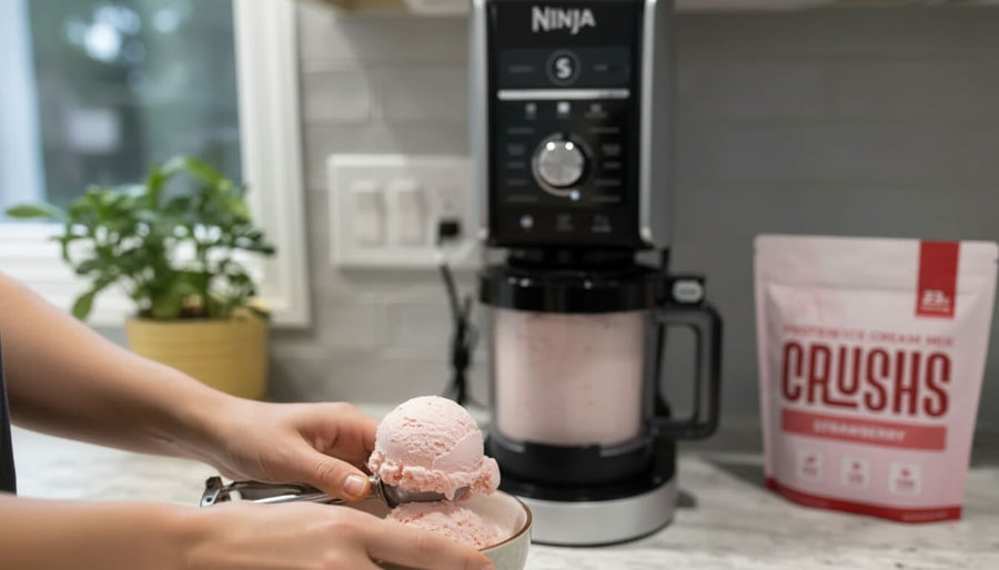 omeone making protein ice cream in a Ninja Creami at home applying ninja creami tips and tricks for a smoother creamier result after spinning.