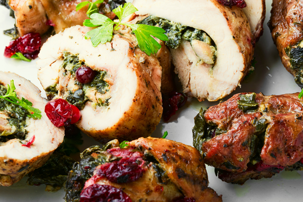 Sliced turkey or chicken roll-ups with herbs and vegetables representing one of the best high protein snacks for summer that is portable, savory, and easy to prep ahead for the week.